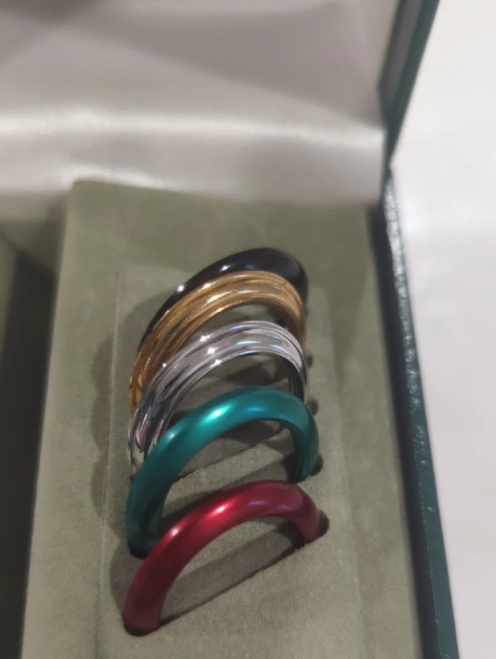 Gucci Gold Bracelet Watch with Blue Bezel and Multi-Color Interchangeable Bezels